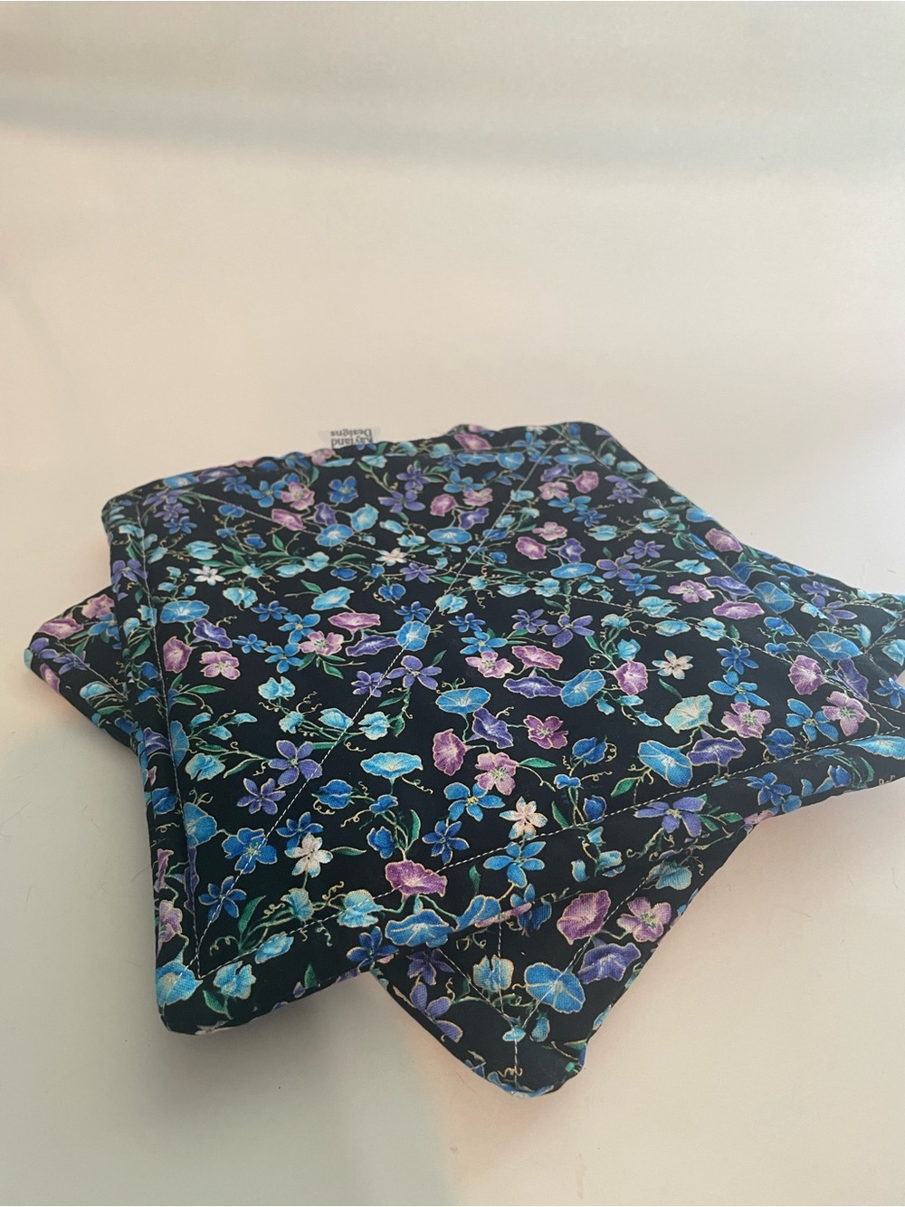 Floral Quilted hot pad- Black with Blue & Purple Blooms